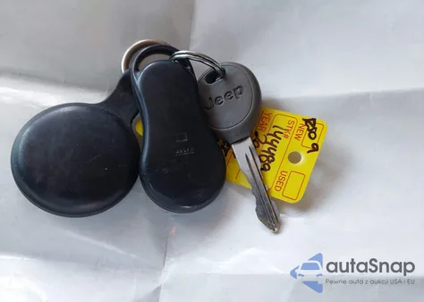 2004 Jeep Grand Cherokee Overland z USA, uszkodzony, nr VIN 1J8GW68J94C214138